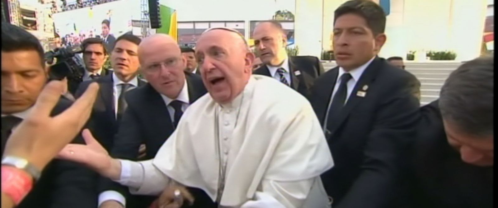 PHOTO: The pontiff almost fell over as crowds tugged on his sleeve during a stop in Mexico.