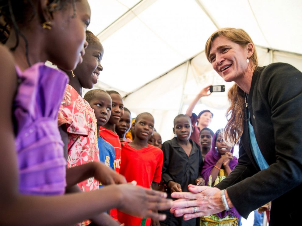 PHOTO: Refugee children meet with U.S. Ambassador to the United Nations Samantha Power as she visits Minawao Refugee Camp on April 18, 2016 in northern Cameroon. 