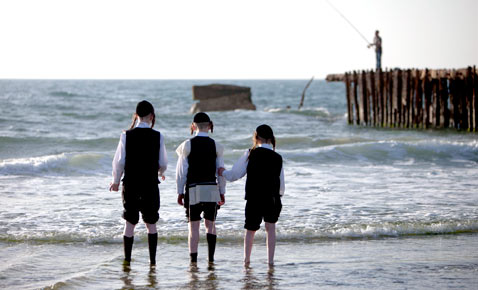 Israel AP israel boys ss thg 120410 wblog Today in Pictures, Syrian Protests, Sikh Pilgrims, Gymnastics, Trapped Miners and Puppies