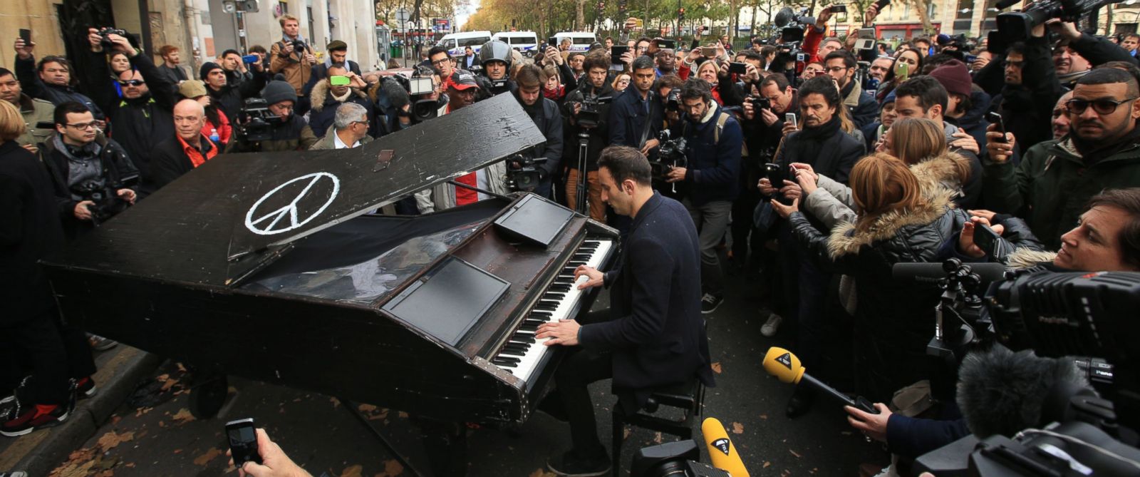 PHOTO: An unnamed man brings his portable grand piano and plays John Lennons Imagine outside the Bataclan concert hall, Nov. 14, 2015 in Paris. 