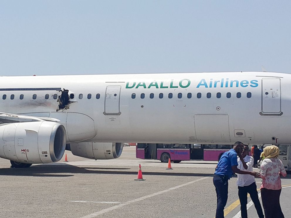 PHOTO:A hole is seen in a plane operated by Daallo Airlines as it sits on the runway of the airport in Mogadishu, Somalia, Feb. 2, 2016.