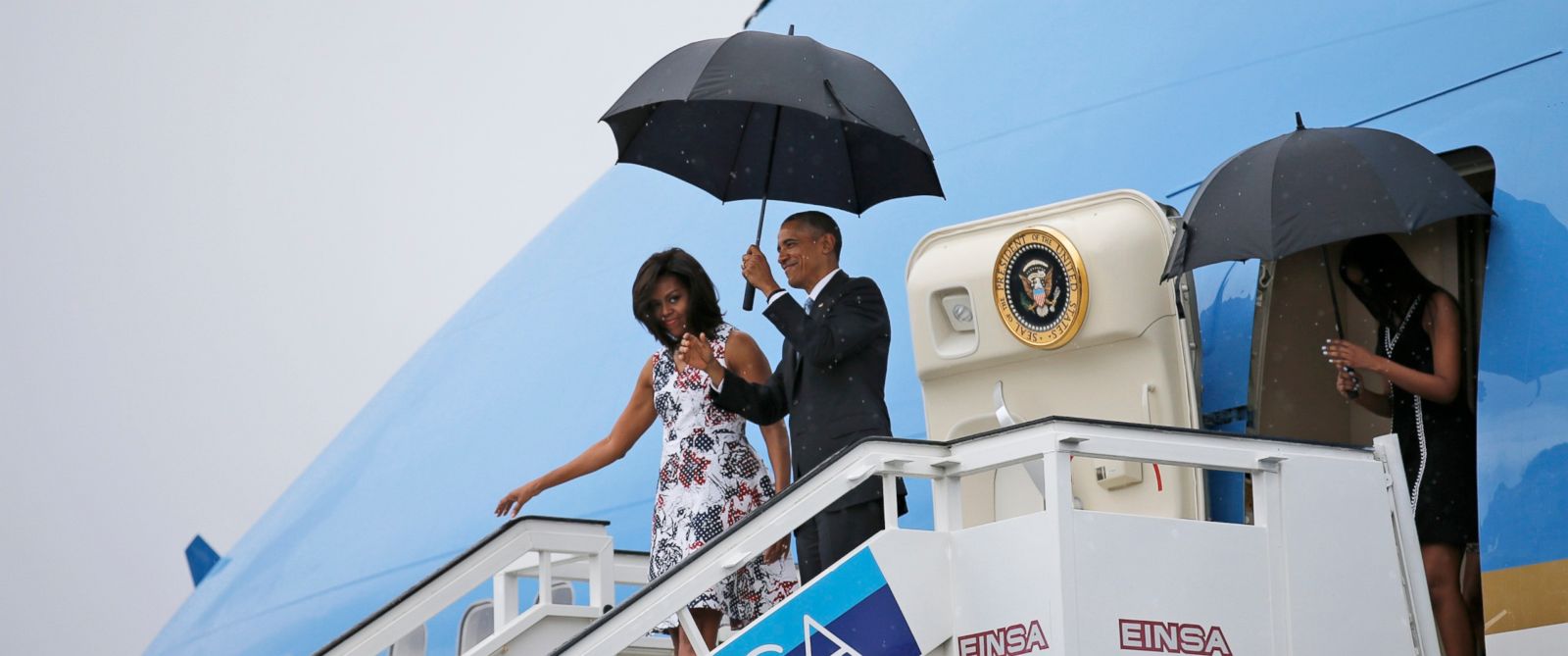 PHOTO: Barack Obama and Michelle exit Air Force One as they arrive at Havanas international airport for a three-day trip, March 20, 2016. 