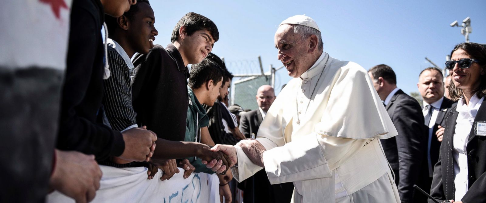 PHOTO: Pope Francis greets migrants and refugees during a visit at the Moria refugee camp on the island of Lesbos, Greece, April 16, 2016.