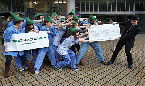 gty bank protest ll 120427 wblog Today in Pictures: Tulips Bloom, Bahrain Protest, Penn Relays