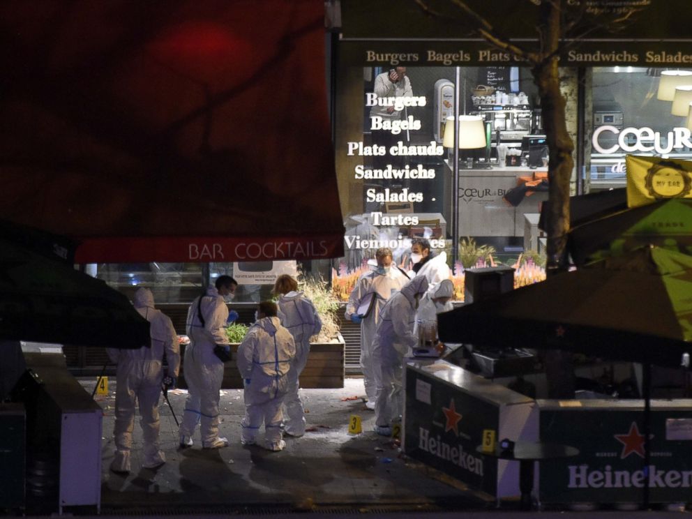 PHOTO: Forensic experts inspect the site of an attack at a restaurant outside the Stade de France stadium in Saint-Denis, north of Paris, on Nov. 14, 2015.