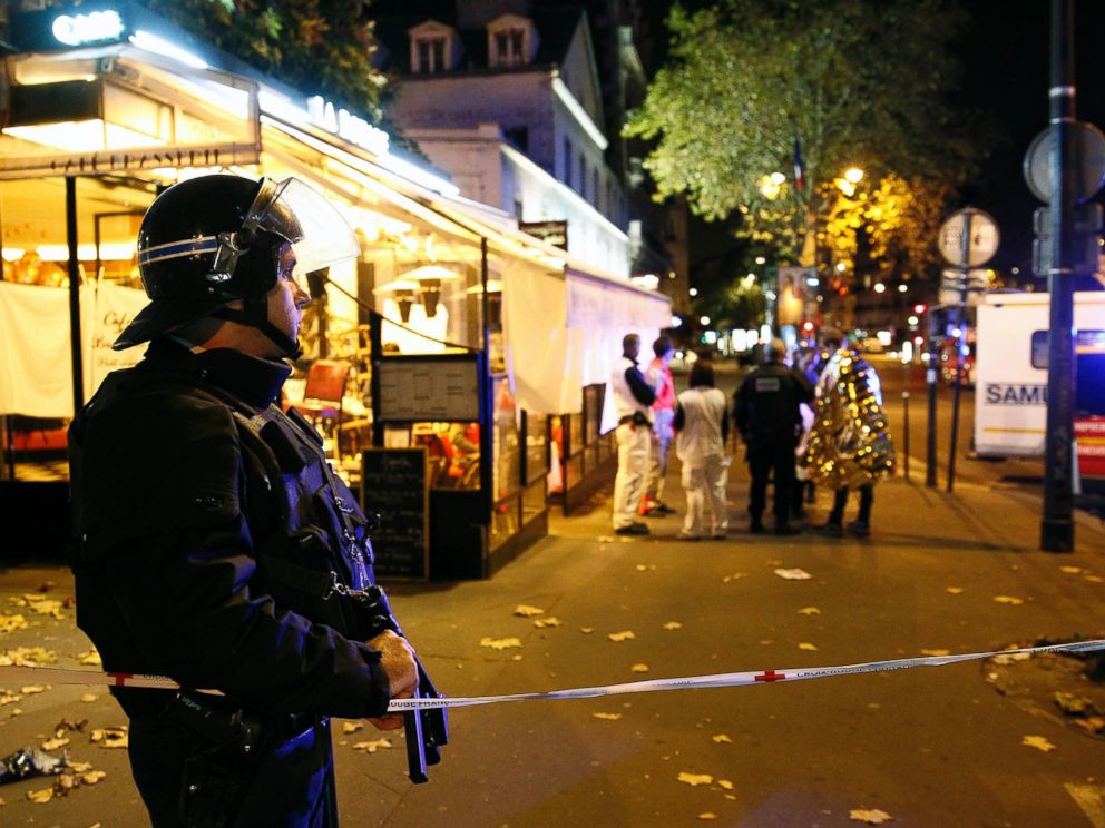 PHOTO: A policeman stands guard near the Boulevard des Filles-du-Calvaire after an attack, Nov, 13, 2015 in Paris.