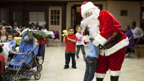 gty santa firefighters nt 111226 wblog Today in Pictures: Dec. 26, 2011