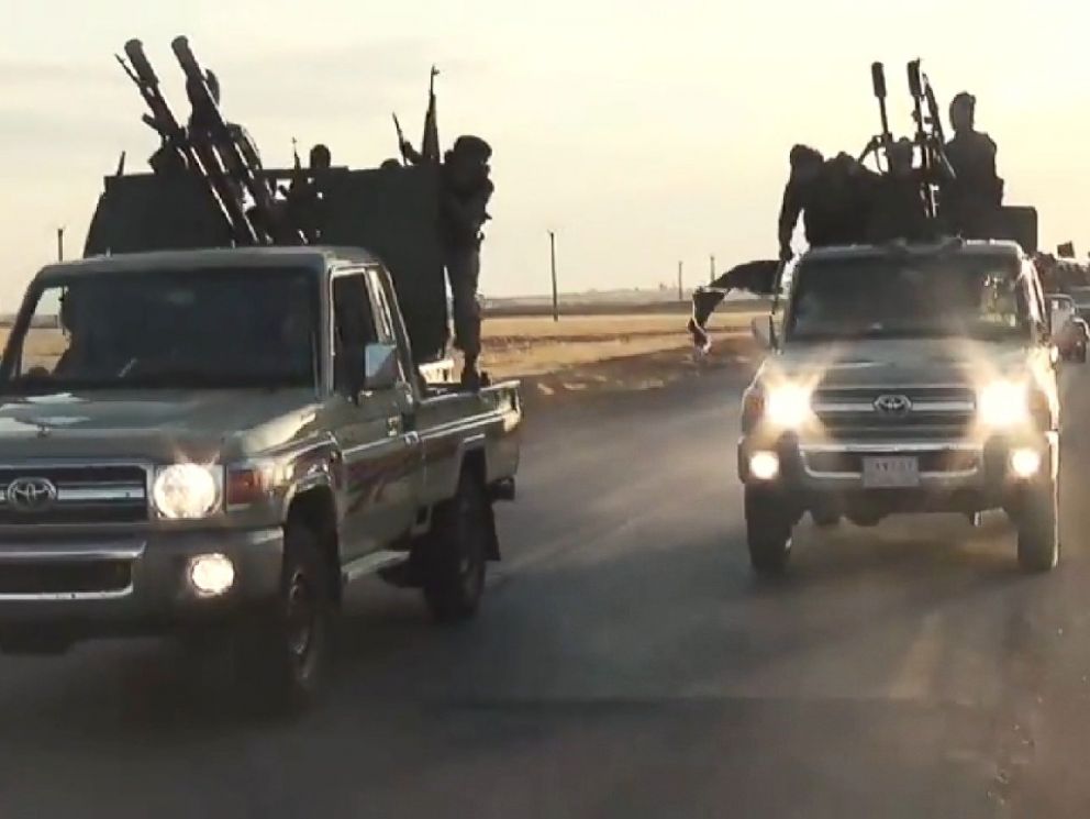 PHOTO: ISIS militants race through Raqqa in a propaganda training film released online in September 2014.