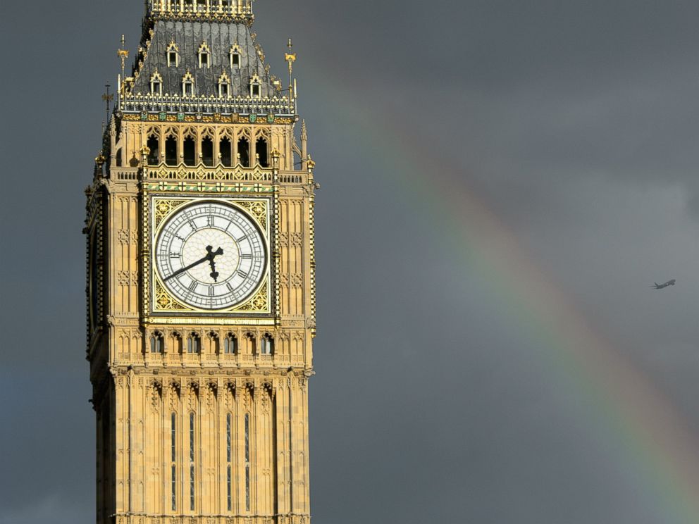 PHOTO: A rainbow appears over Saint Stephens Tower, widely mistakenly known as Big Ben, September 16, 2013, in London. 