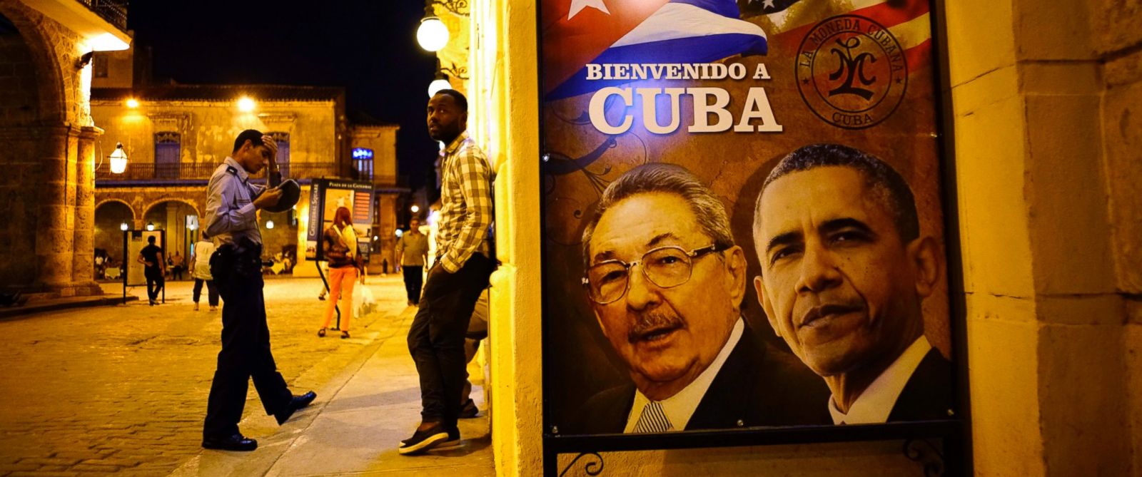 PHOTO: A poster features portraits of Cubas President Raul Castro, left, and President Barack Obama and reads in Spanish "Welcome to Cuba" outside a restaurant in Havana, Cuba, March 17, 2016. 