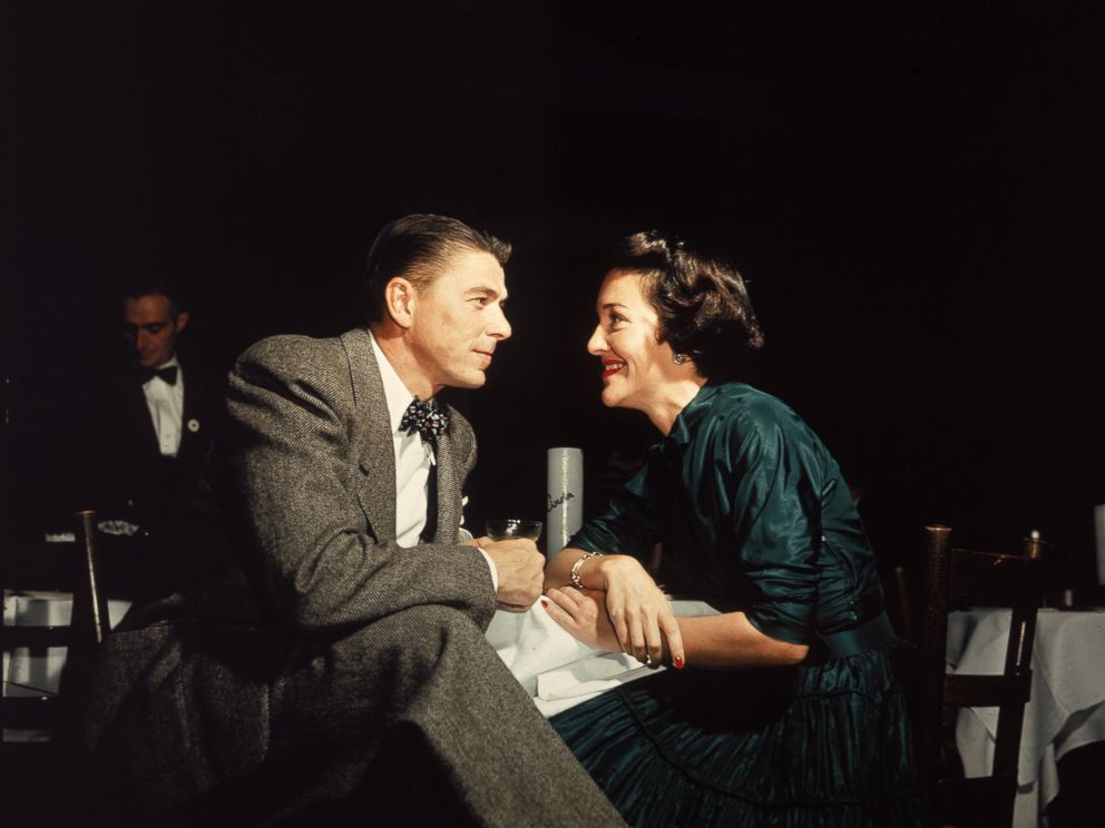 PHOTO:Ronald Reagan and Nancy Reagan gaze at one another across a table, circa 1952.