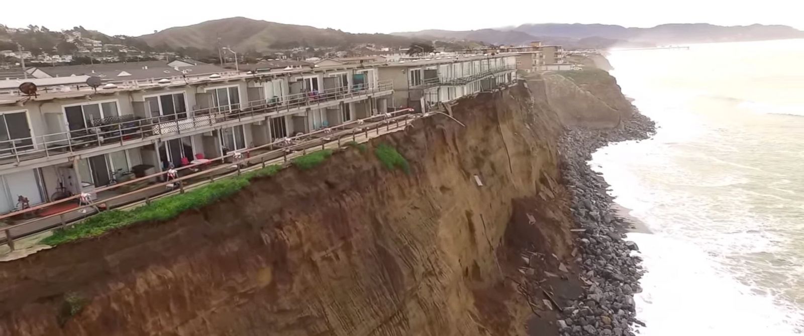 Dramatic Photos Show Apartments Just Feet Away From Falling Into the