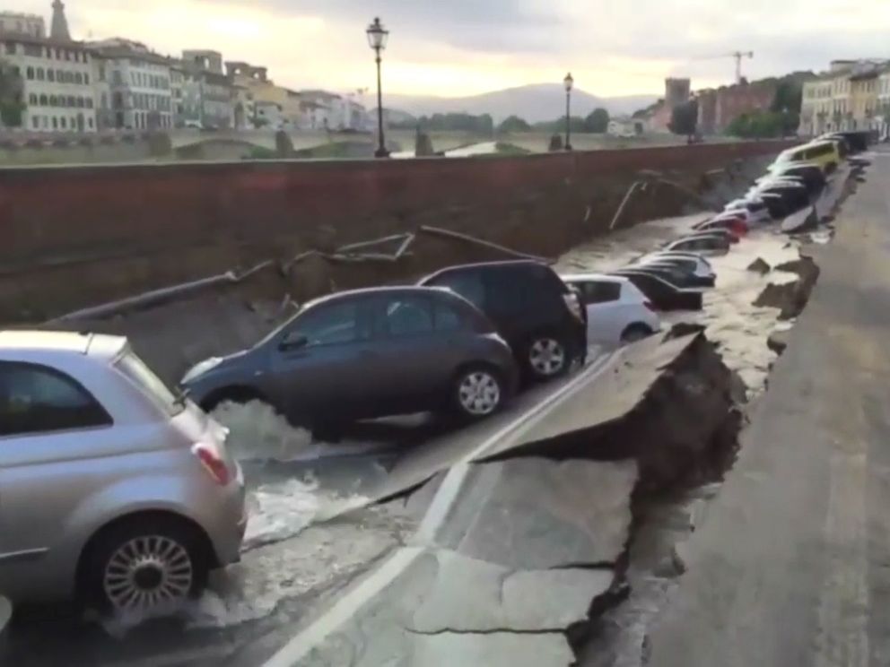 PHOTO: This 200-meter-long sinkhole created chaos in a Florence, Italy tourist neighborhood on May 25. 