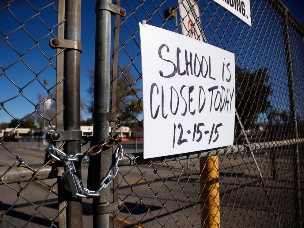 PHOTO: A gate to Birmingham Community Charter High School is locked with a sign stating that school is closed, Dec. 15, 2015, in Van Nuys, Calif.