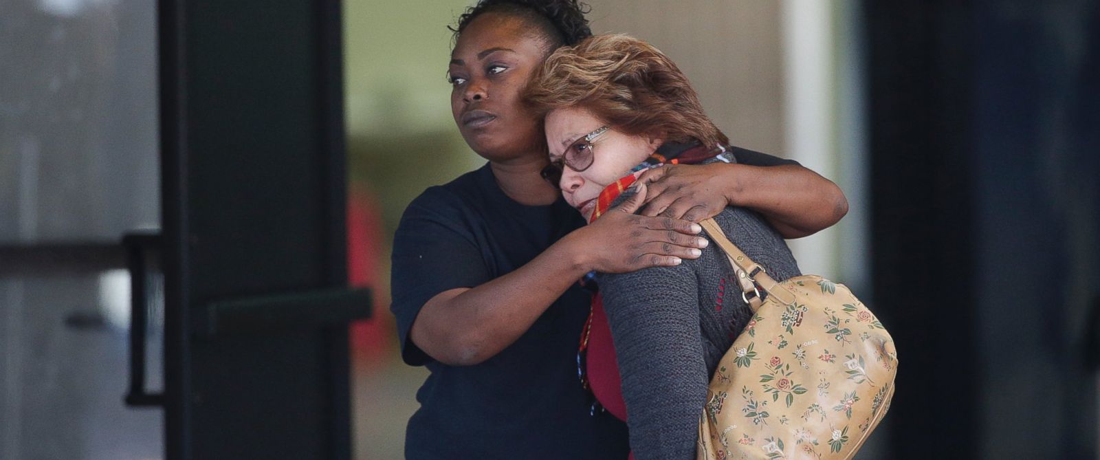 PHOTO: Two women embrace at a community center where family members are gathering to pick up survivors after a shooting rampage that killed multiple people and wounded others at a social services center in San Bernardino, Calif., Dec. 2, 2015. 