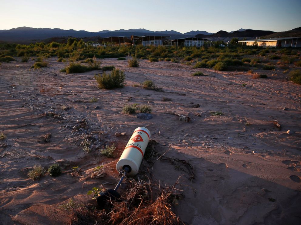 PHOTO: A buoy lies high and dry above the water line at the now defunct Echo Bay Marina in the Lake Mead National Recreation Area, May 19, 2016. Lake Meads surface was at its lowest level Wednesday since the reservoir was created. 
